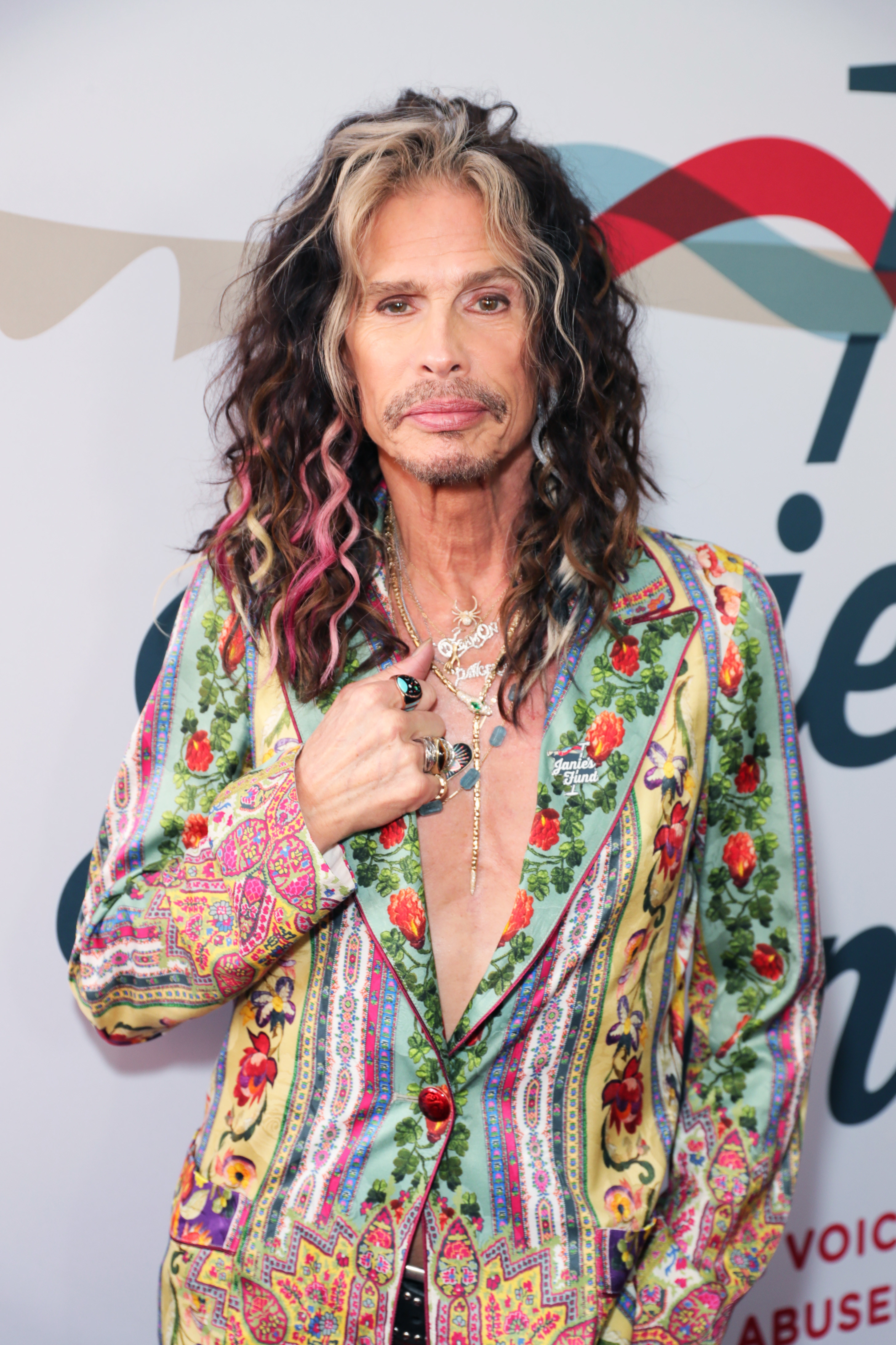 steven tyler in a colorful suit