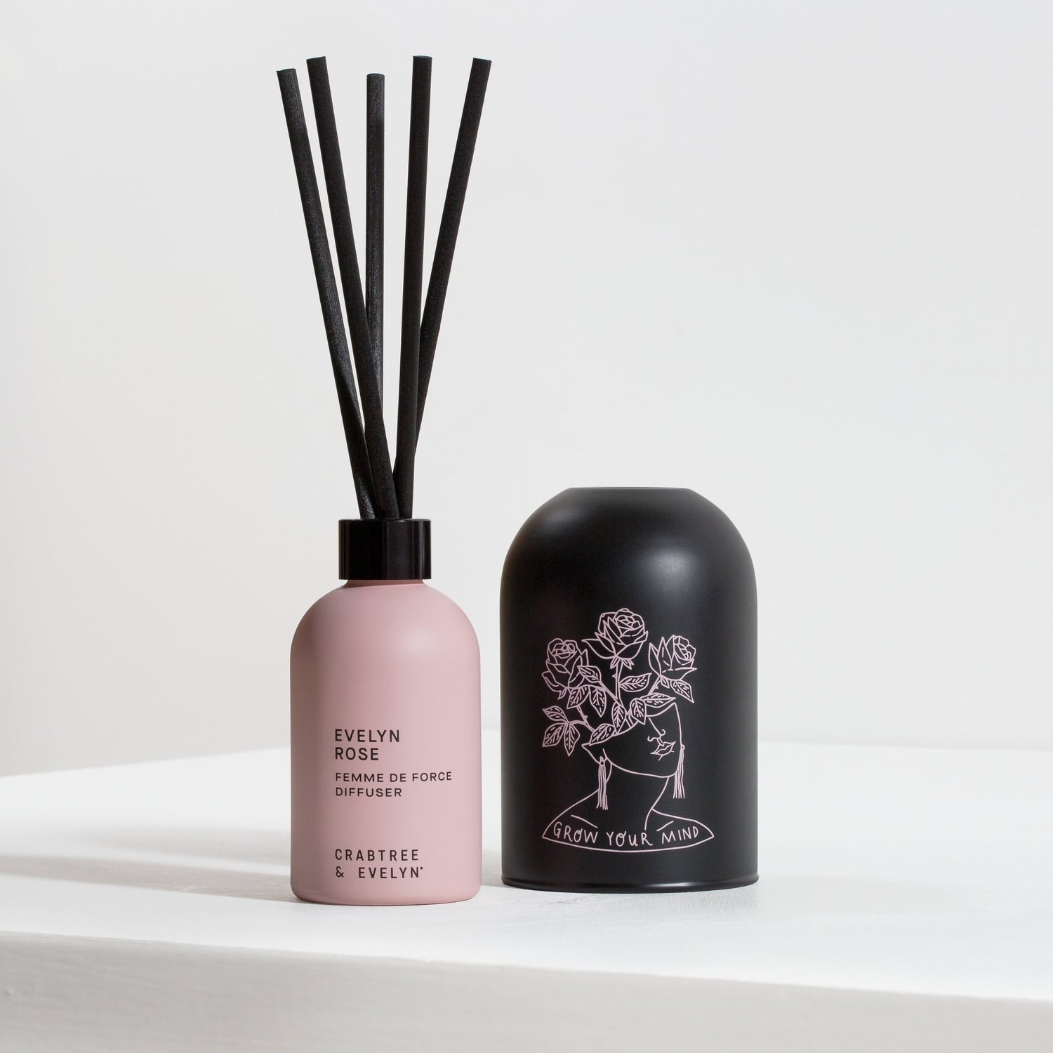 the pink diffuser with black cup next to it