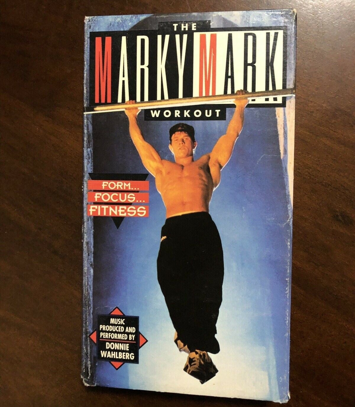 A cover featuring Mark doing a pull-up