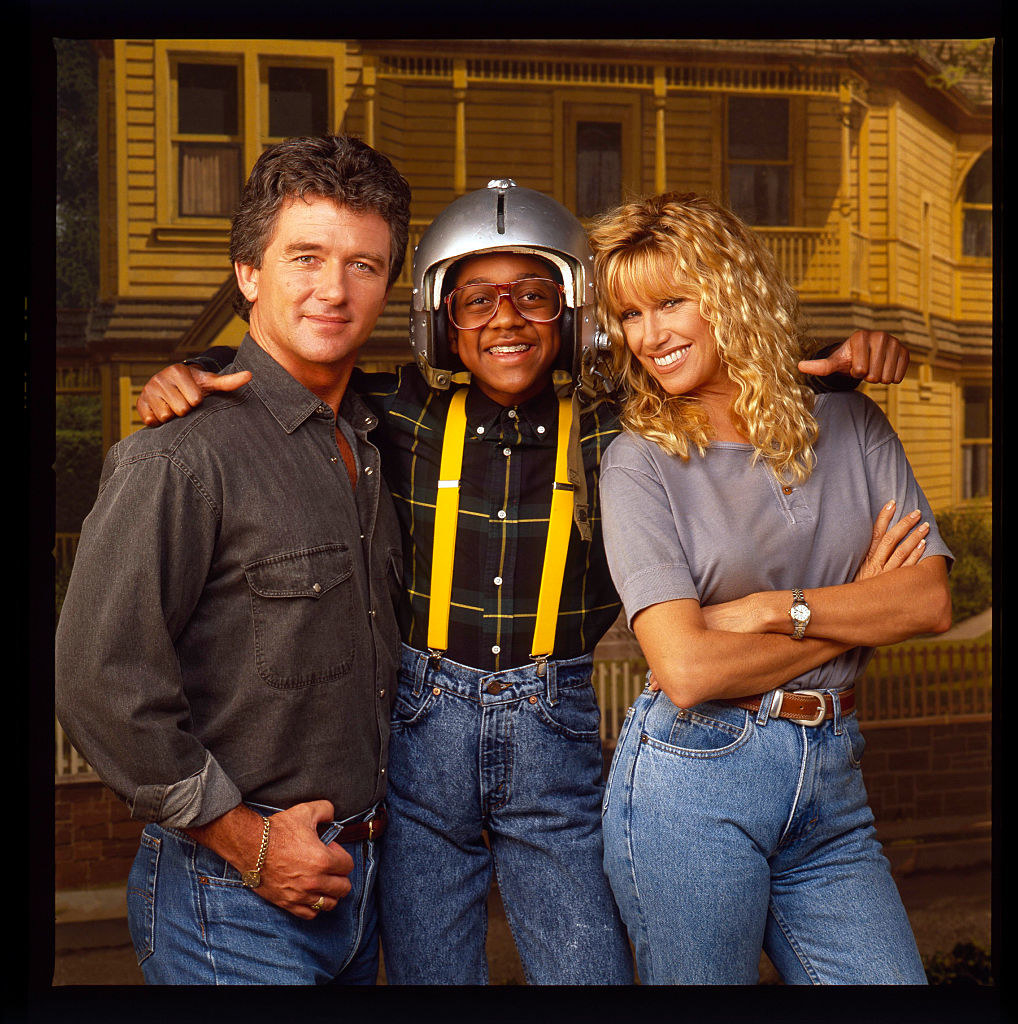 Patrick Duffy, Jaleel White, and Suzanne Summers posing in a photo