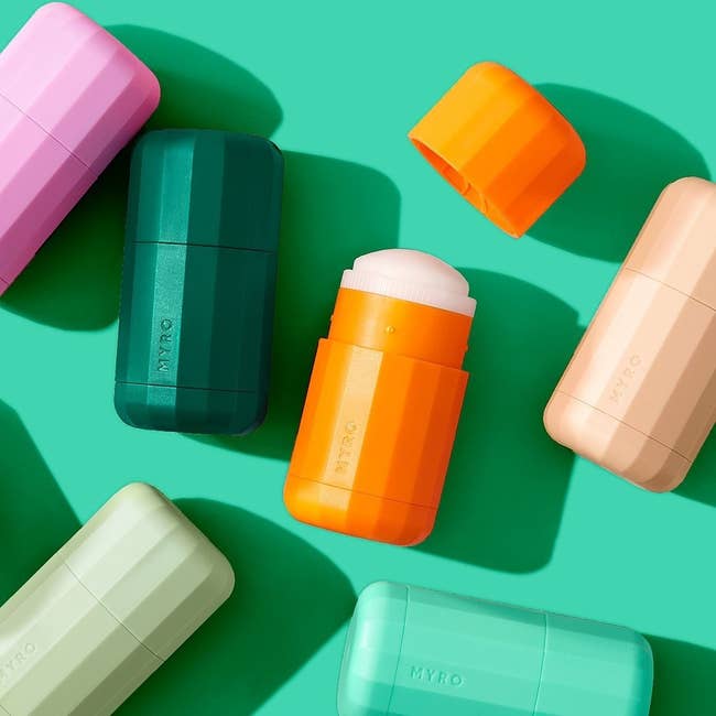 colorful containers of deodorant