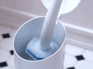 a gif showing how the toilet bowl brush has a detachable, disposable head