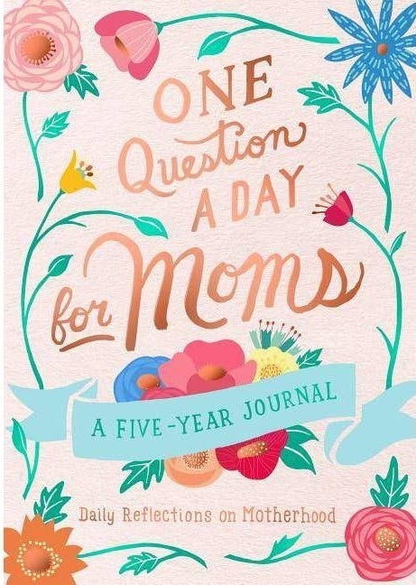 the light pink book cover with the title &quot;One Question A Day For Moms: A five-year journal Daily Reflections on Motherhood&quot; and illustrations of flowers on it