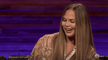gif of Chrissy Tiegan on the TV show &quot;Bring The Funny&quot; making a face that basically says &quot;Yeah, that&#x27;s right&quot;