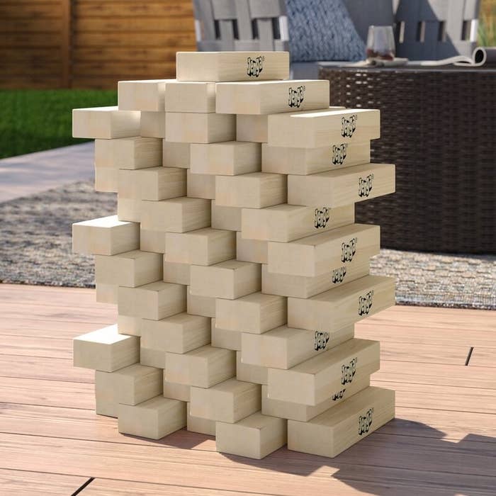 A set of large wooden Jenga blocks stacked up 