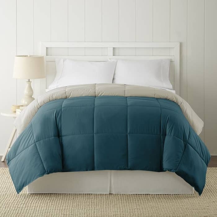 The quilted comforter in blue and oatmeal