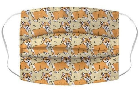 A mask with cartoon corgis showing off their lil butts