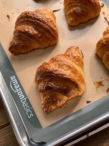 A reviewer's croissants cooked on a sheet pan