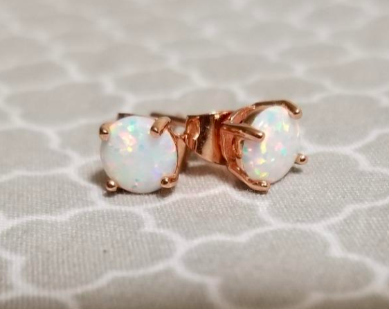 the rose gold and opal studs