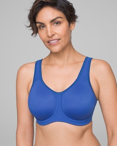 a model wearing a blue sports bra