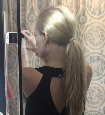 reviewer with long blond ponytail 