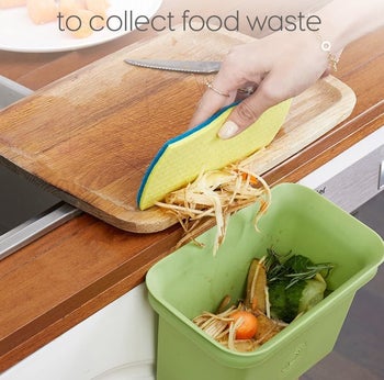 the green bin attached to a kitchen countertop