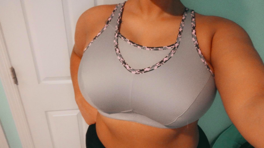 a reviewer wearing the gray bra