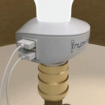 adapter with two USB cords plugged into base