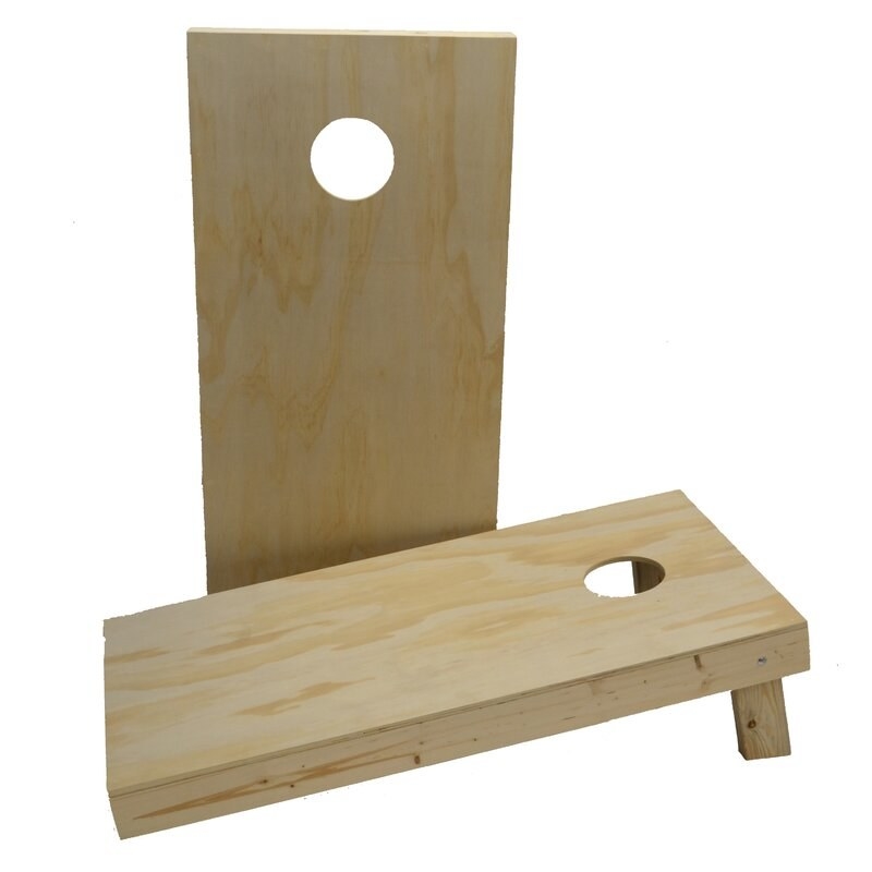 Two plain wood corn hole boards