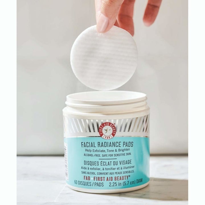 the white round pads in the blue and white jar