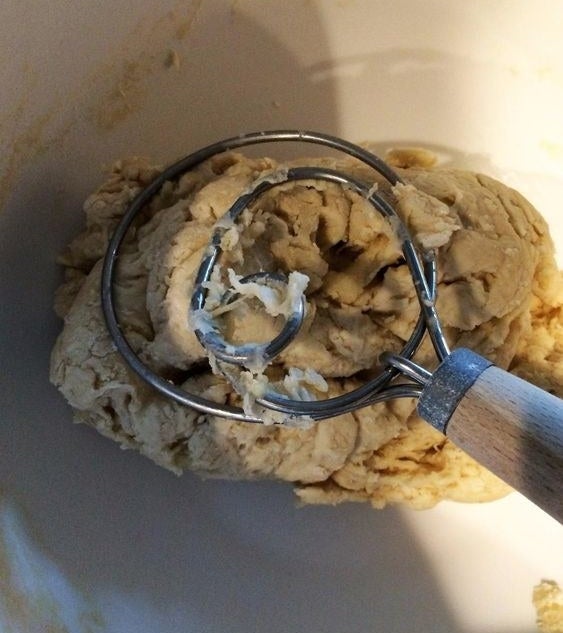 the whisk whisking chocolate chip cookie dough 