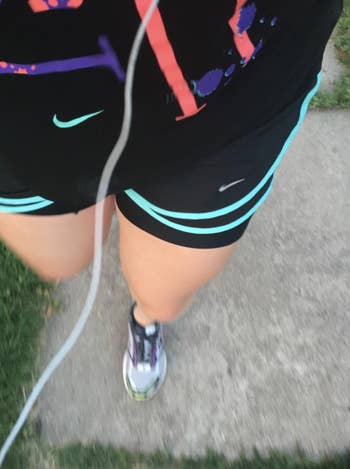 reviewer wears same thigh bands under running shorts while working out