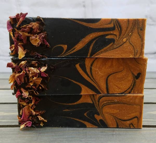 black and gold swirled soap with dry flyers attached to side