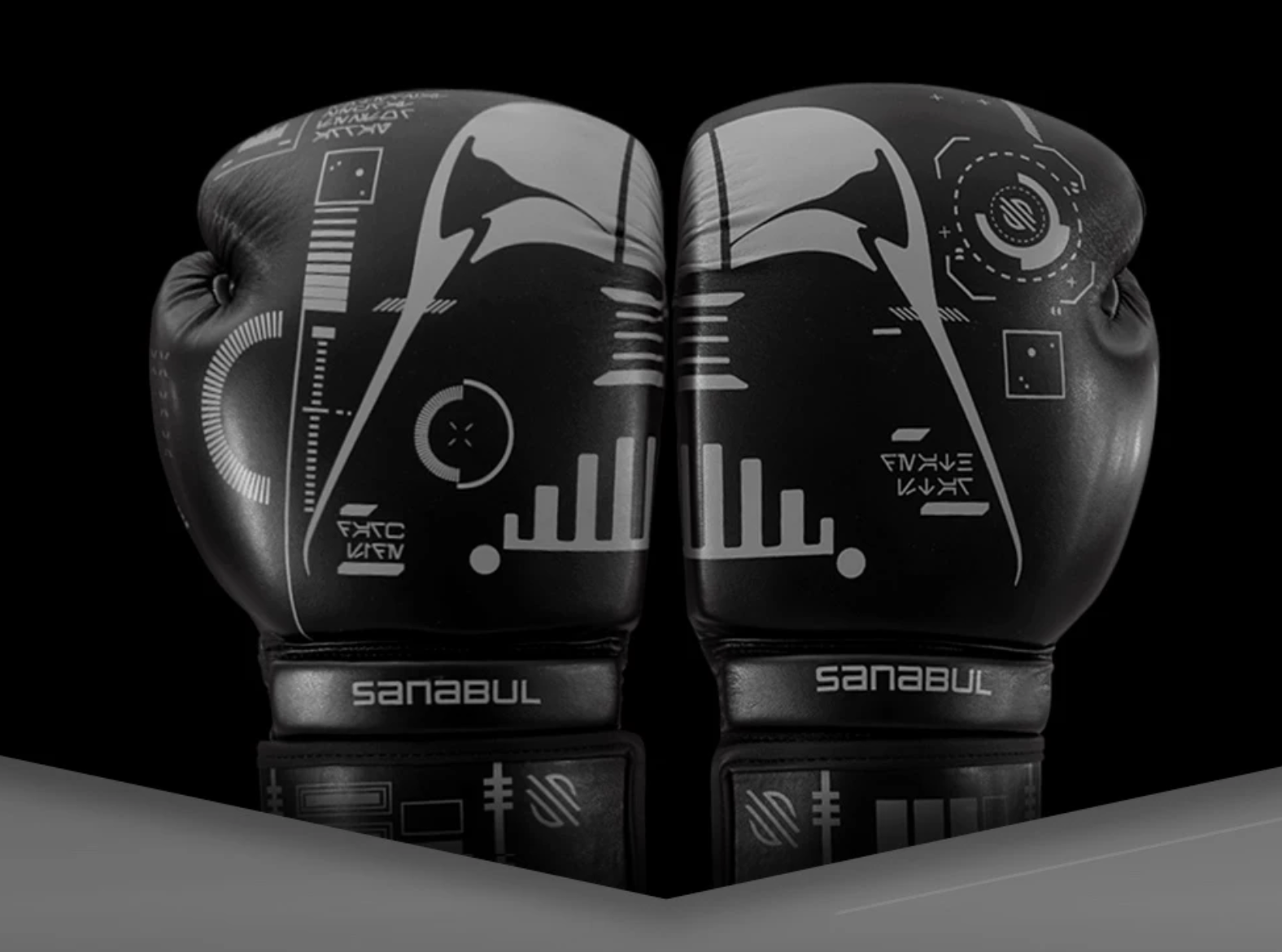 a pair of black boxing gloves with a darth vader design on them in grey