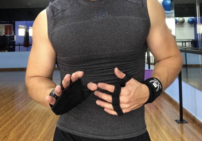 a fitness model wearing the gloves