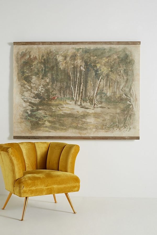 paper tapestry hung on wall. forest watercolor scene. 