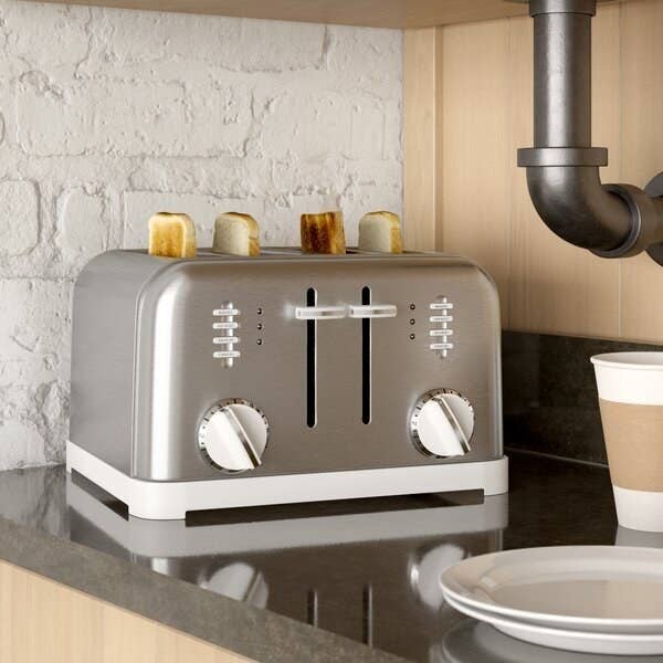 Darling stainless steel toaster with white knobs on either side