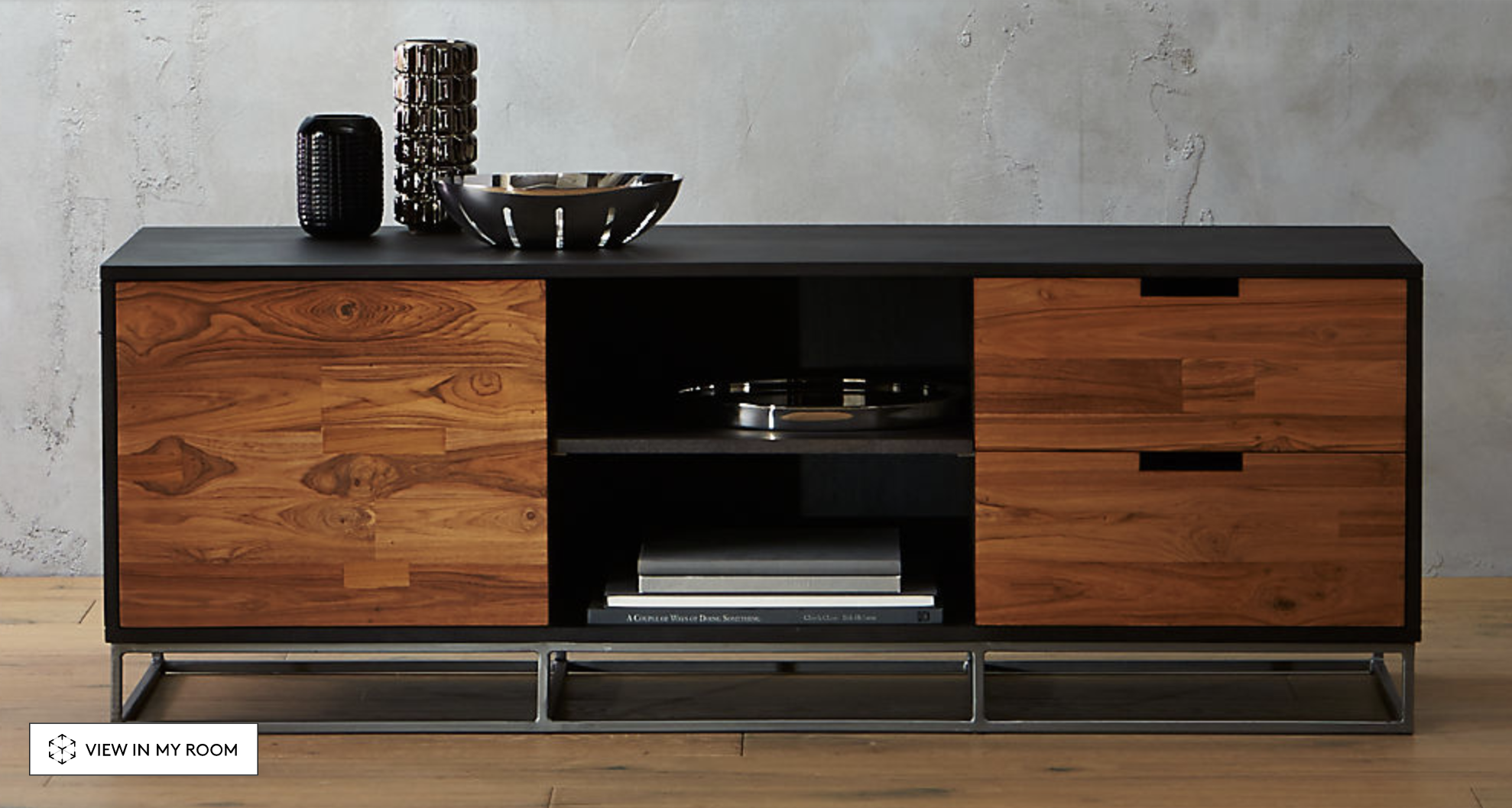 A mixed media credenza made of a dark mango wood and teak with an iron base