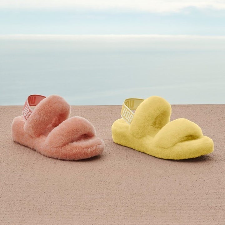 pink and yellow fluffy ugg slippers with a strap around the ankle and two loops over the foot