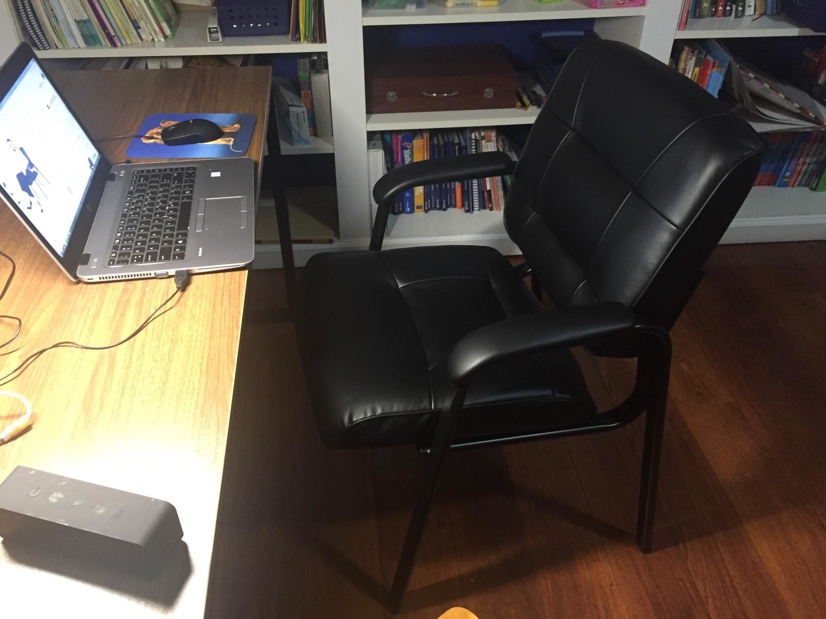 Reviewer image of the chair at a desk