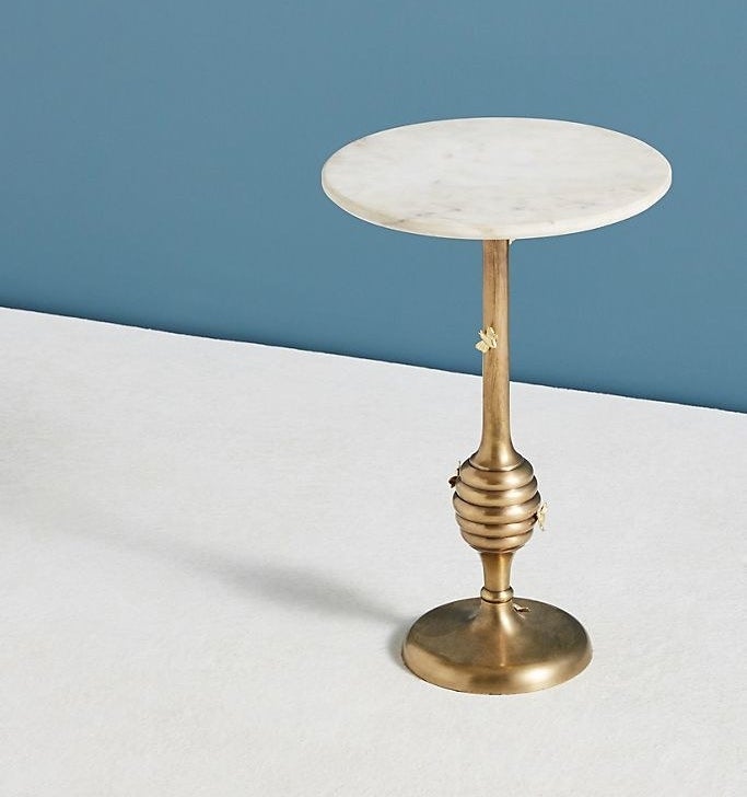 the marble and brass side table