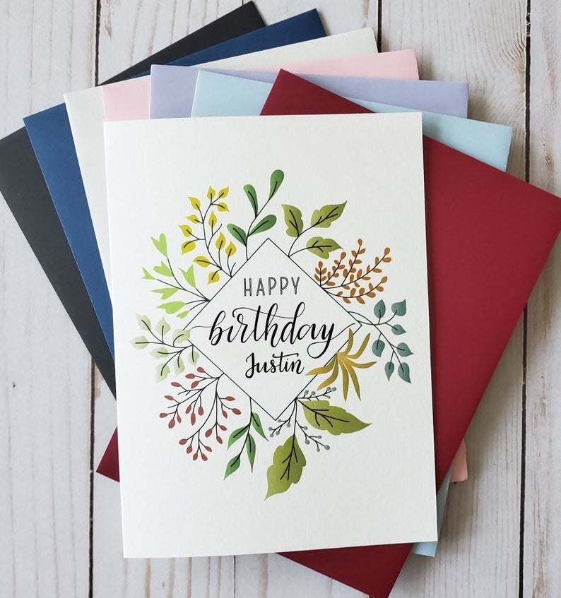 A card that reads &quot;Happy birthday&quot; and can be personalized by name and has an illustrations of leaves