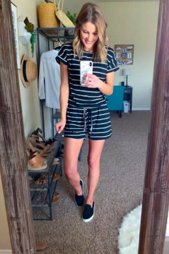 reviewer in black and white stripe short sleeve romper