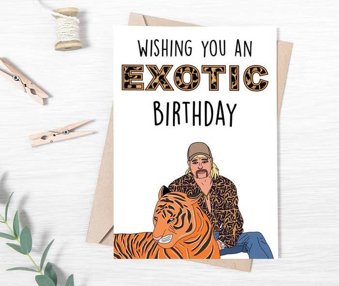 A card that reads &quot;Wishing you an exotic birthday&quot; with an illustration of Joe Exotic and a tiger