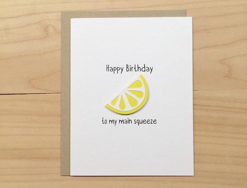 A card that reads "Happy birthday to my main squeeze" and has a cut-out lemon pasted on it