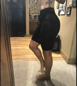 A side view of a person wearing the biker shorts 