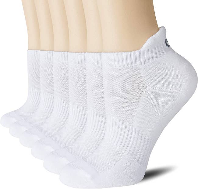The white socks modeled on feet 