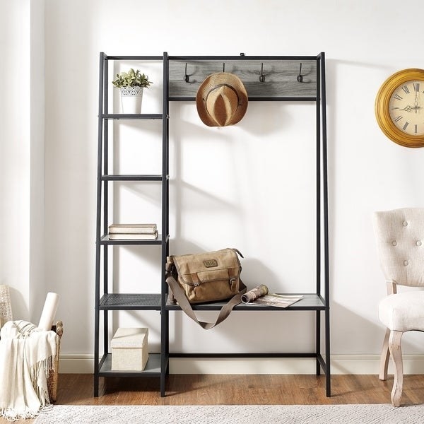 bench with an attached vertical open shelf and hooks for storage across the top. Made for storage near a front door. 