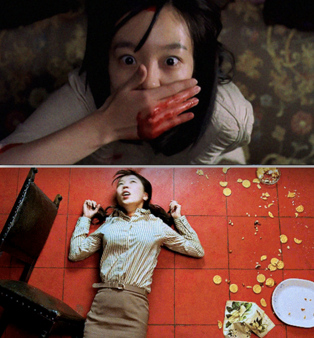 One woman with a bloodied hand covering her mouth, and the other lying on the floor