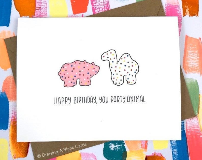 A card that reads &quot;Happy birthday, you party animal&quot; with illustrated frosted animal crackers