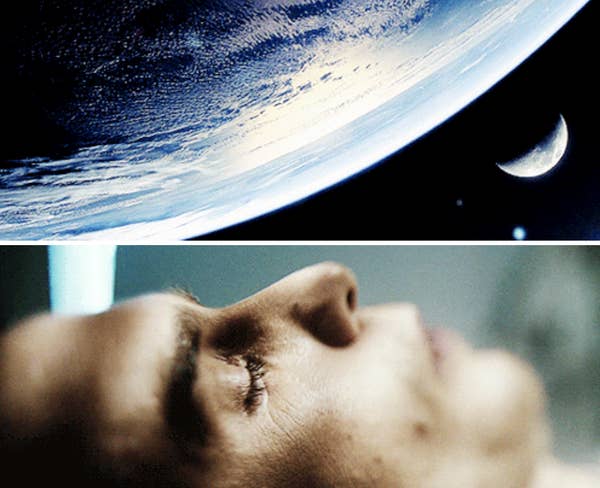 A man staring up at space