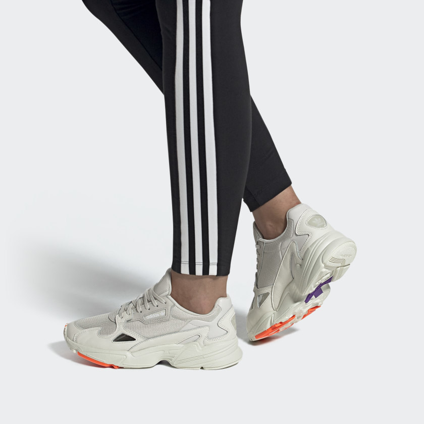 Chunky white dad shoes paired with a classic track pant 