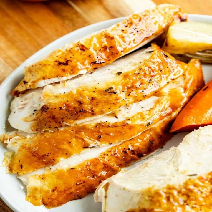 Cooked chicken with crispy skin and tender meat.