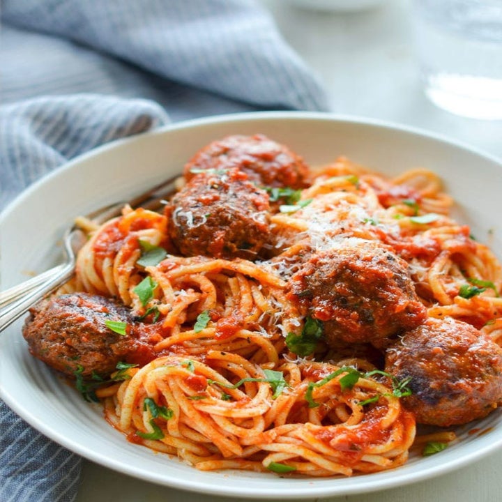 Heaping bowl of spaghetti and meatballs.