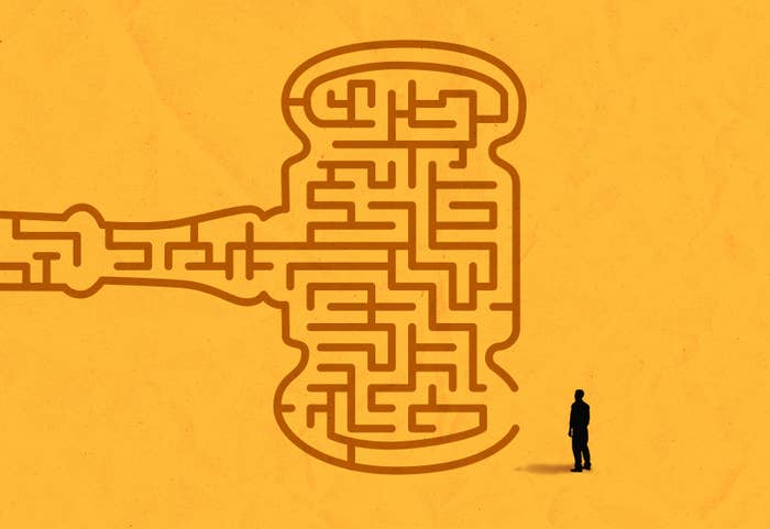 an illustration of man staring at a maze that looks like a judge&#x27;s gavel