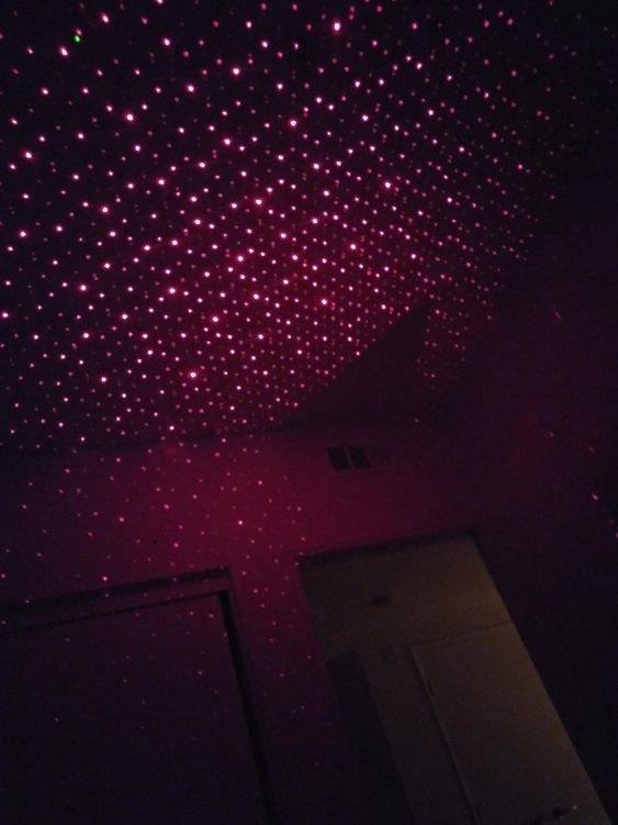 Another reviewer&#x27;s picture of the star projector but in their bedroom 
