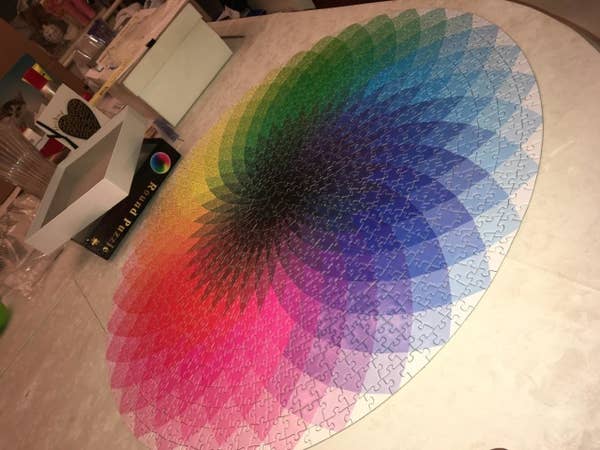 A reviewer image of the completed puzzle. The circle has a fan of different colors with a black center 