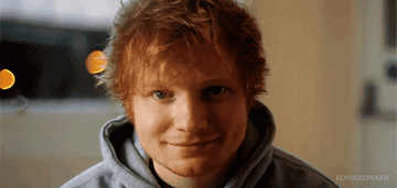 Ed Sheeran smiles