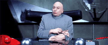 Dr. Evil sitting in a fancy chair