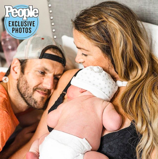 Jamie Otis and Doug Hehner with their new baby, Hayes.